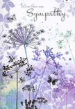 This sympathy card feels like a gentle poem painted in watercolour, the kind of image that might come to mind while looking across the quiet greenery that surrounds Chigwell. Against a background of washed purples, soft blues, and silvery greens, fine silhouettes of wild, umbelliferous flowers stretch upwards, their narrow stems rising with a sense of quiet determination. Each flower head is composed of tiny, lace-like clusters, rendered so softly that they appear almost transparent at the edges, as though dissolving into the cool light. The colours are cool yet comforting: muted lavenders, hints of indigo, and touches of sage green that blend and blur, like distant hedgerows seen through morning mist near Chigwell Row or along Manor Road. Scattered among the blooms, delicate butterflies hover in mid-air, their wings faintly tinted and only lightly defined, suggesting movement, transformation, and a comforting nearness of loved ones who are no longer here. The card's composition is balanced and uncluttered, with generous negative space that allows for reflection, much like a quiet corner of a local church garden. There is no harsh contrast, only gentle gradients and soft edges, giving the entire scene a dreamlike, contemplative quality. From the perspective of a local florist, this artwork mirrors the understated grace many families in Chigwell seek when sending condolences: respectful, soothing, and rooted in nature's quiet reassurances. Paired with soft-toned funeral flowers delivered to a home or chapel, this card becomes a tender expression of sincere sympathy and enduring care.
